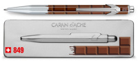 Купить Caran d’Ache Office Essentialy Swiss - Chocolate, шариковая ручка, M, металлическая коробка арт. 849.752
